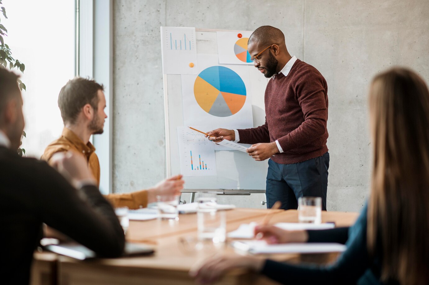 side-view-man-doing-presentation-meeting_23-2148817044